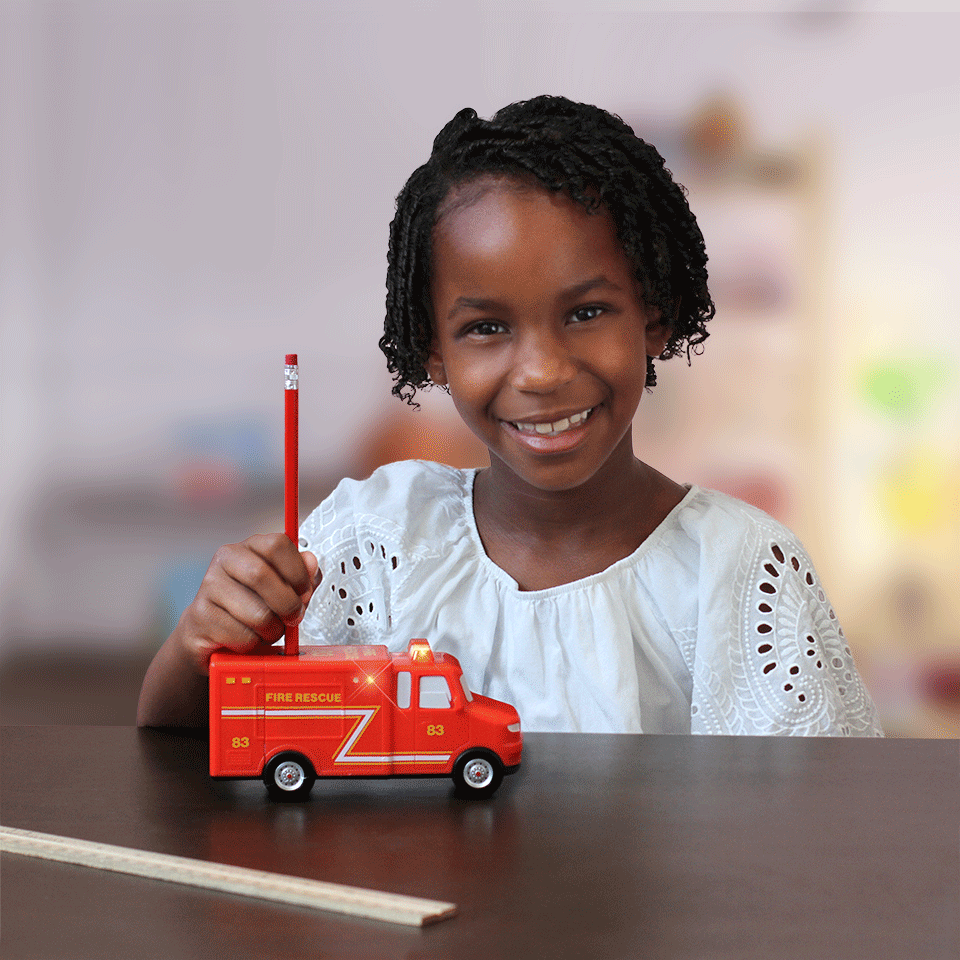 Girl with Fire Truck Themed Pencil Sharpener